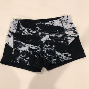 Marble and black tight athletic shorts
